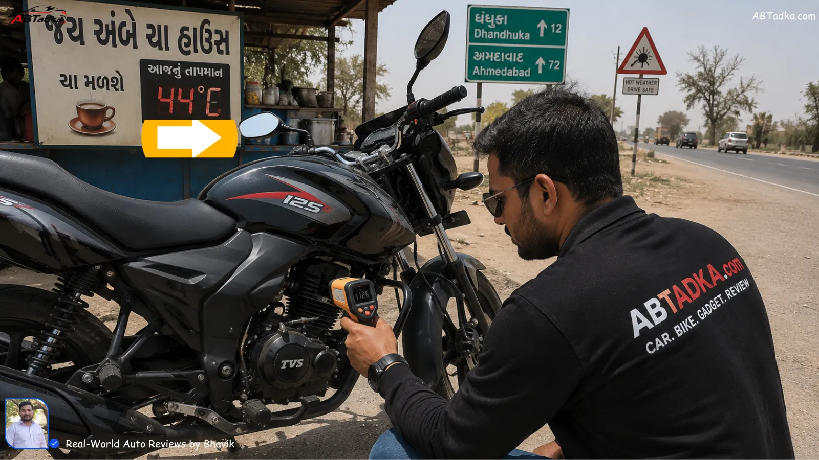 Bhavik Munjapara using infrared thermometer to check engine oil temperature on a 125cc bike parked at roadside tea stall near Dhandhuka, Gujarat during 44°C summer heat test