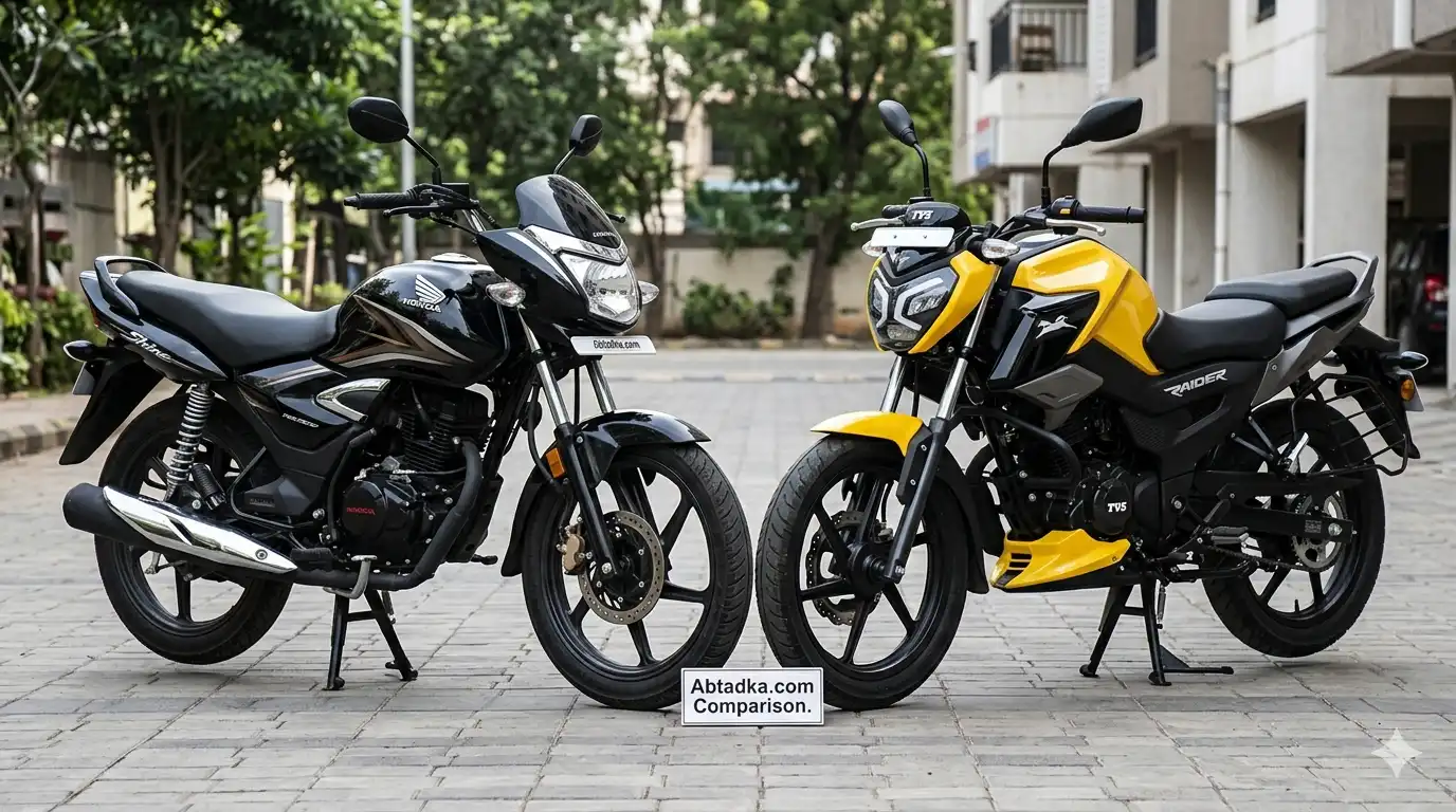 A side-by-side comparison shot of a black Honda Shine 125 and a yellow TVS Raider 125 motorcycle parked together outdoors on a paved area in front of buildings.