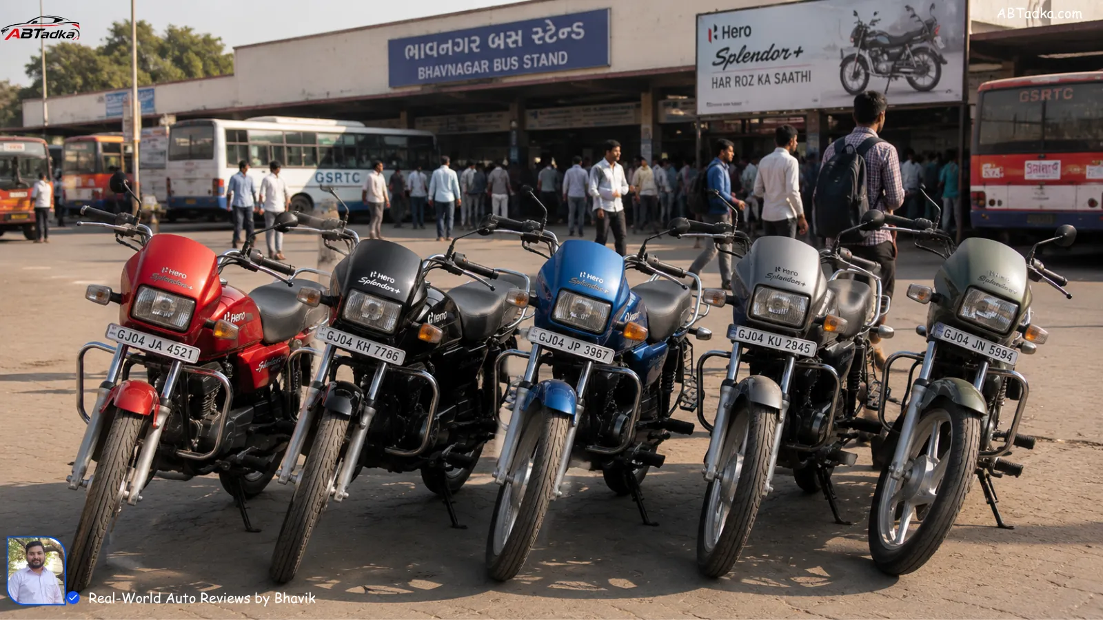 Row of 5 Hero Splendor Plus bikes in different colors parked at Bhavnagar Bust stand, showing popularity among daily commuters