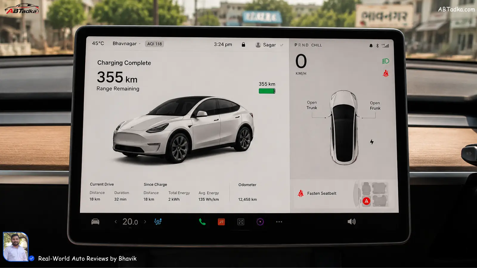 Tesla Model Y touchscreen showing 355km range remaining with outside temperature 45°C in Ahmedabad and AC set to 20°C